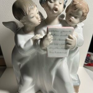 Lladro Porcelain Figurine with White and Cream Accents